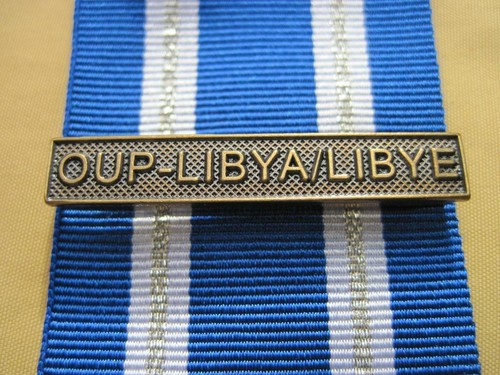 Agrafe bronze oup libya - en,
